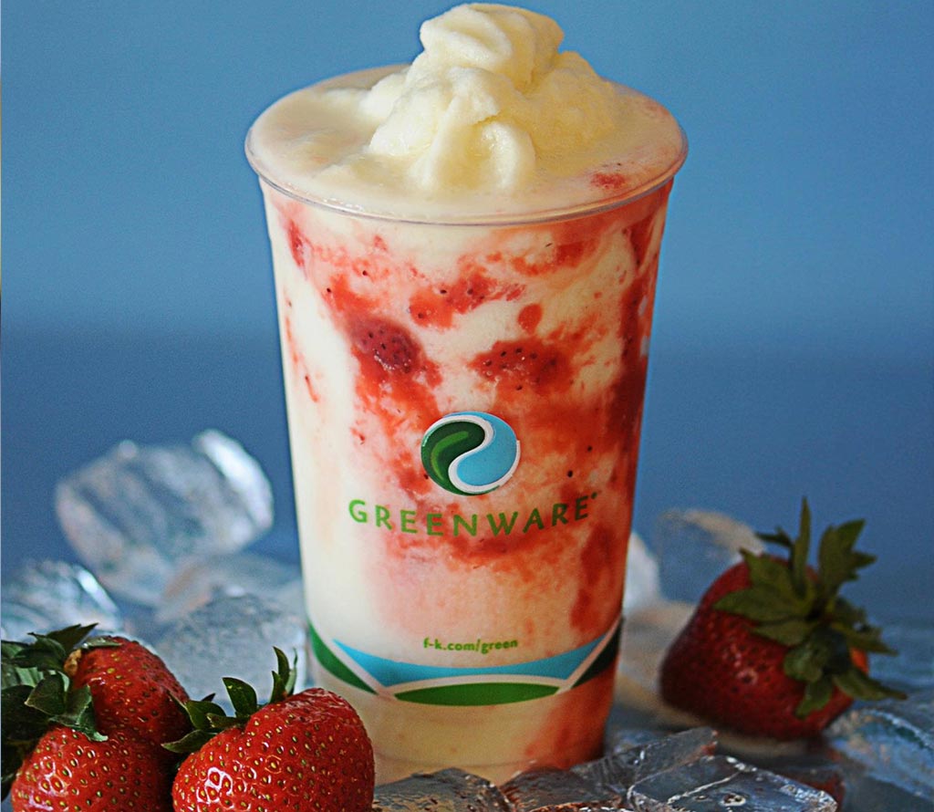 Colorful strawberry smoothie with whipped cream